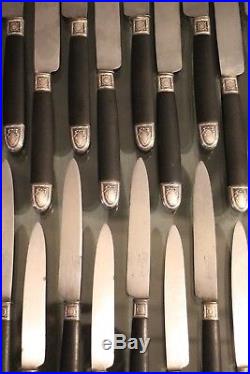 12 grands couteaux + 12 entremets manche ébène virole argent 19e style Louis 16