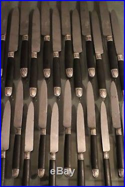 12 grands couteaux + 12 entremets manche ébène virole argent 19e style Louis 16