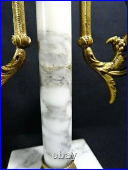 Ancienne pendule de cheminée avec ses pendants style Louis XVI à colonnes XIXéme