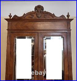 Armoire a glace style Louis XVI en noyer vers 1880