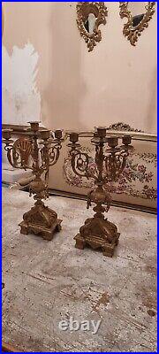 Beautiful pair of Louis XVI style candlesticks in gilded bronze/brass/regule