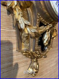 Cartel d'applique en bronze doré style Louis XVI