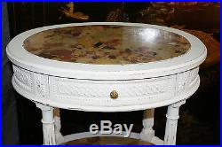 Chevet / table de salon en chêne sculpté et mouluré de style Louis XVI