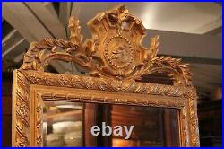 Console demi-lune avec miroir en bois doré de style Louis XVI