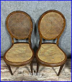 Exceptionnelle série de 6 chaises raquettes de style Louis XVI en loupe