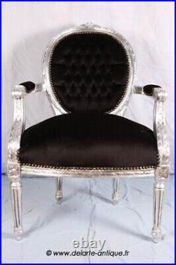 Fauteuil de style Louis XVI noir bois argent