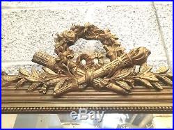 Glace de style Louis XVI en bois et stuc doré / Miroir / Trumeau