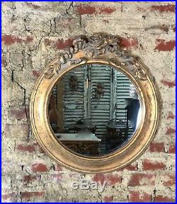 Glace / miroir rond style Louis XVI bois et stuc patiné doré diam 60 cm