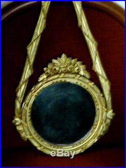 Glace / miroir ronde ancien style Louis XVI en bois doré rare très décorative