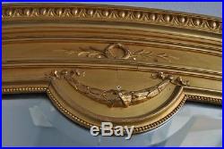 Grand miroir style Louis XVI stuc doré XIXème
