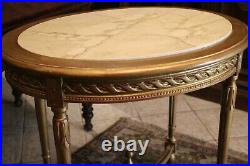 Guéridon table de milieu en bois doré de style Louis XVI