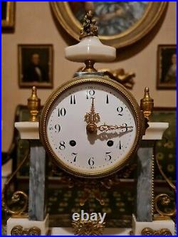 Horloge Ancienne en marbre et bronze style Louis XVI