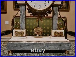 Horloge Ancienne en marbre et bronze style Louis XVI