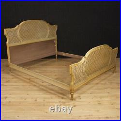 Lit double meuble italien en bois laqué doré style ancien Louis XVI