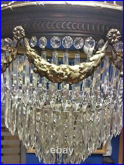 Lustre à pampilles de cristal et bronze de style Louis XVI époque 19e