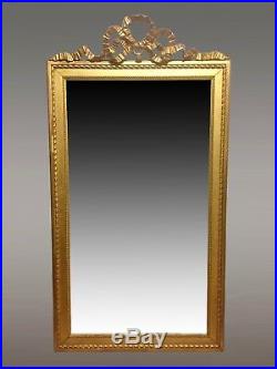 Miroir doré style Louis XVI fronton ruban