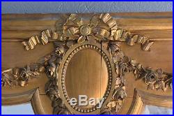 Miroir en bois et stuc doré d'époque XIXème de style Louis XVI