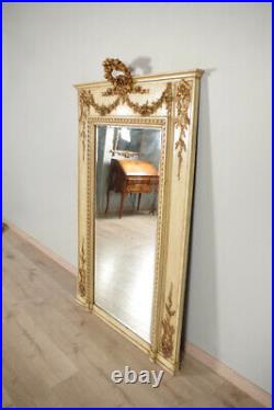 Miroir laqué et doré style Louis XVI