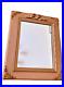 Miroir rose poudré en bois avec moulures style louis XVI dimensions 55×45 cm