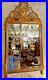 Miroir style louis XV en bois doré haut 133 larg 79 prof 6.5 cm