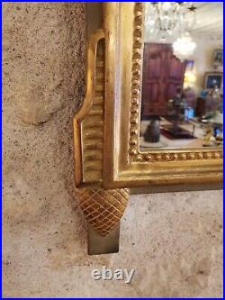 Miroir style louis XV en bois doré haut 133 larg 79 prof 6.5 cm