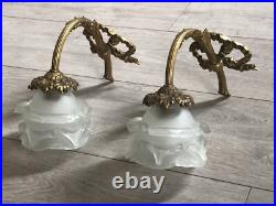 Paire appliques bronze style Louis XVI décor noeud ruban et feuillage