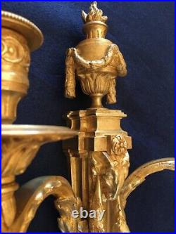 Paire d'appliques en Bronzes dorés Style Transition modéle de Pitoin