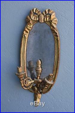 Paire d'appliques miroir 2 feux en bois doré et laqué de style Louis XVI