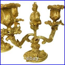 Paire de bougeoirs à deux bras de lumière bronze doré style rocaille époque XIXe
