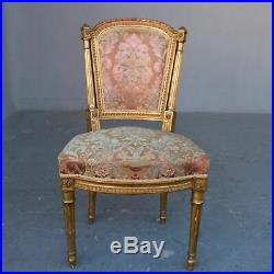 Paire de chaises style Louis XVI laquées dorées XIXème