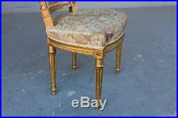 Paire de chaises style Louis XVI laquées dorées XIXème