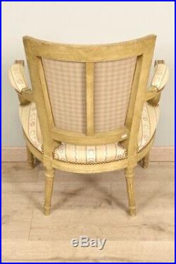 Paire de fauteuils cabriolets peints style Louis XVI
