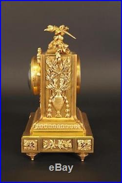 Pendule en bronze doré style Louis XVI par Raingo
