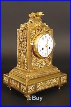 Pendule en bronze doré style Louis XVI par Raingo