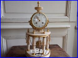 Pendule style Louis XVI, marbre et bronzes dorés