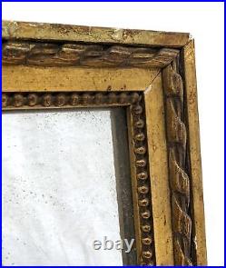 Petit miroir de style Louis XVI perlé bois doré XIXème