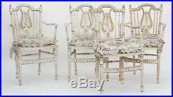 Série de 4 fauteuils cannés de style Louis XVI