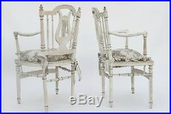Série de 4 fauteuils cannés de style Louis XVI