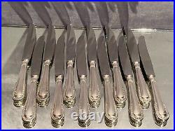 Suite 12 grands couteaux de table métal argenté rang de perles style Louis XVI