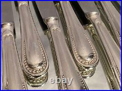 Suite 12 grands couteaux de table métal argenté rang de perles style Louis XVI