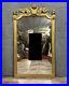 Très grand miroir de style Louis XVI en bois doré vers 1850